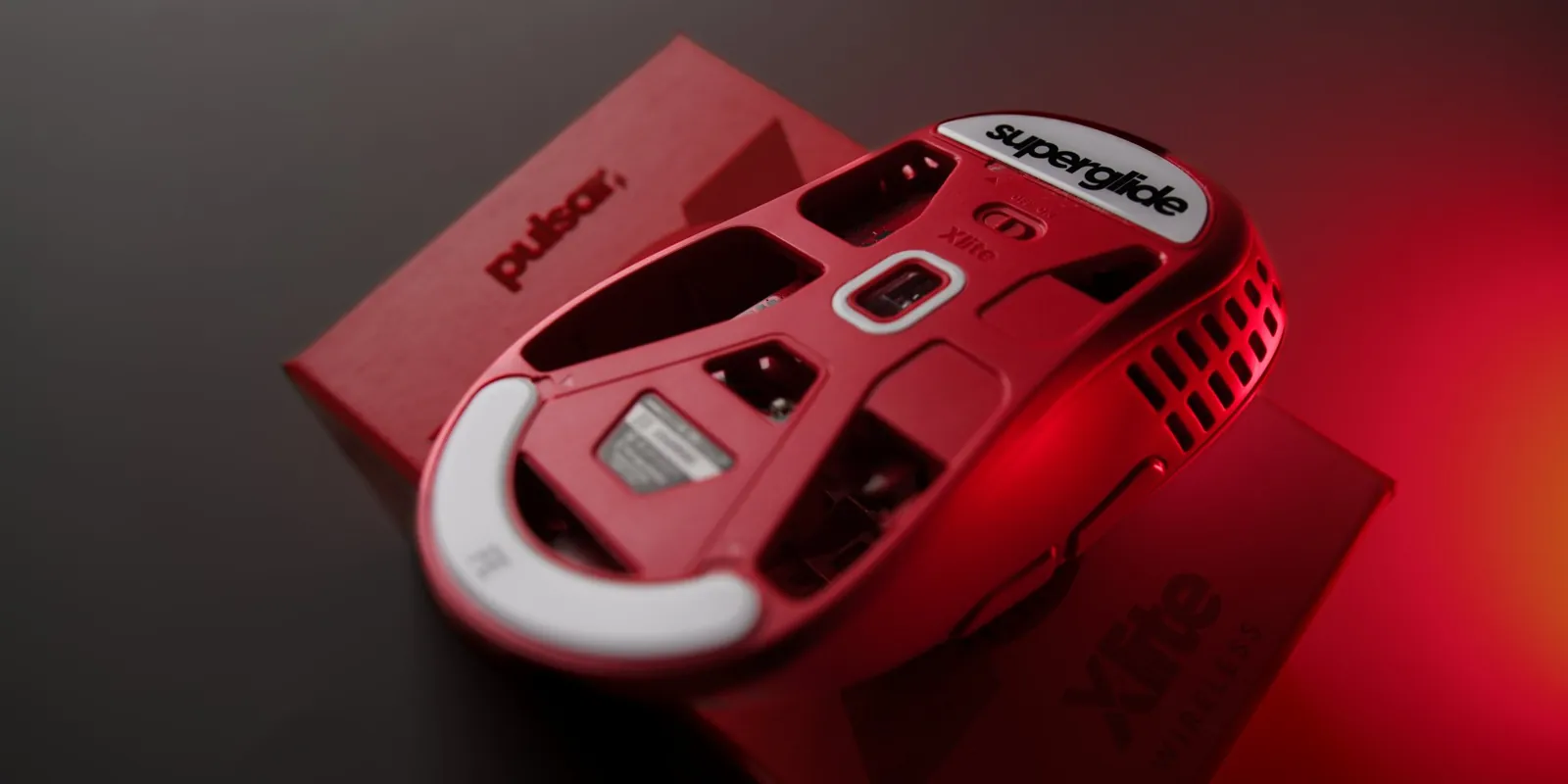 In-box hero, red key. Packaging.